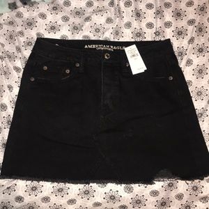 Black denim skirt